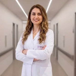 Op. Dr. Özgen Nahya Özdoğar — Kadın Hastalıkları Ve Doğum, Çiğli, İzmir. Portre fotoğrafı.