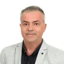 Dr. Bekir Hucuptan — İzmir. Portre fotoğrafı.