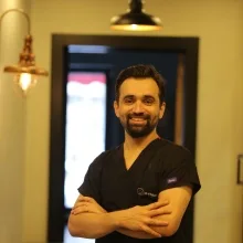 Dr. Dt. Hasan İlhan Mutaf — Ortodonti, Kayseri. Portre fotoğrafı.