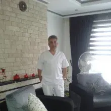 Dt. Muammer Kocabay — Diş Hekimi, Ankara. Portre fotoğrafı.