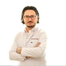 Uzm. Dr. Ekrem Dutoğlu — İç Hastalıkları, Tokat. Portre fotoğrafı.