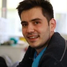 Uzm. Dt. Eray Alkan — Endodonti. Portre fotoğrafı.