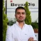 Dt. Türker Karcı — Diş Hekimi, Adana. Portre fotoğrafı.